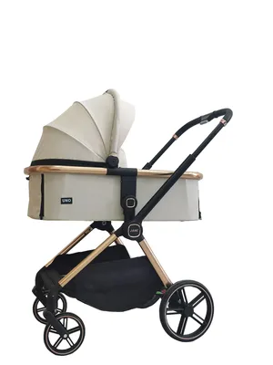 עגלת תינוק -ג'אנה JANE מבית UNO צבע שמנת מרכב רוז גולד עגלה משולבת הכוללת אמבטיה וטיולון דו כיווני בעיצוב מדהים